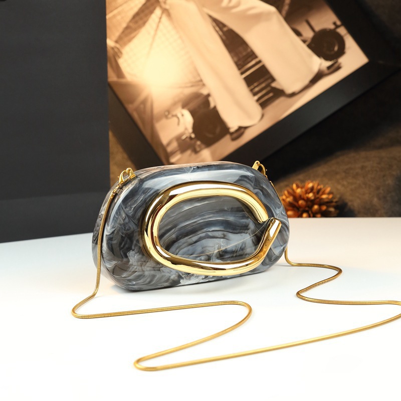 Luxury Bags Photos - Artistic fluid pattern shaped capsule box